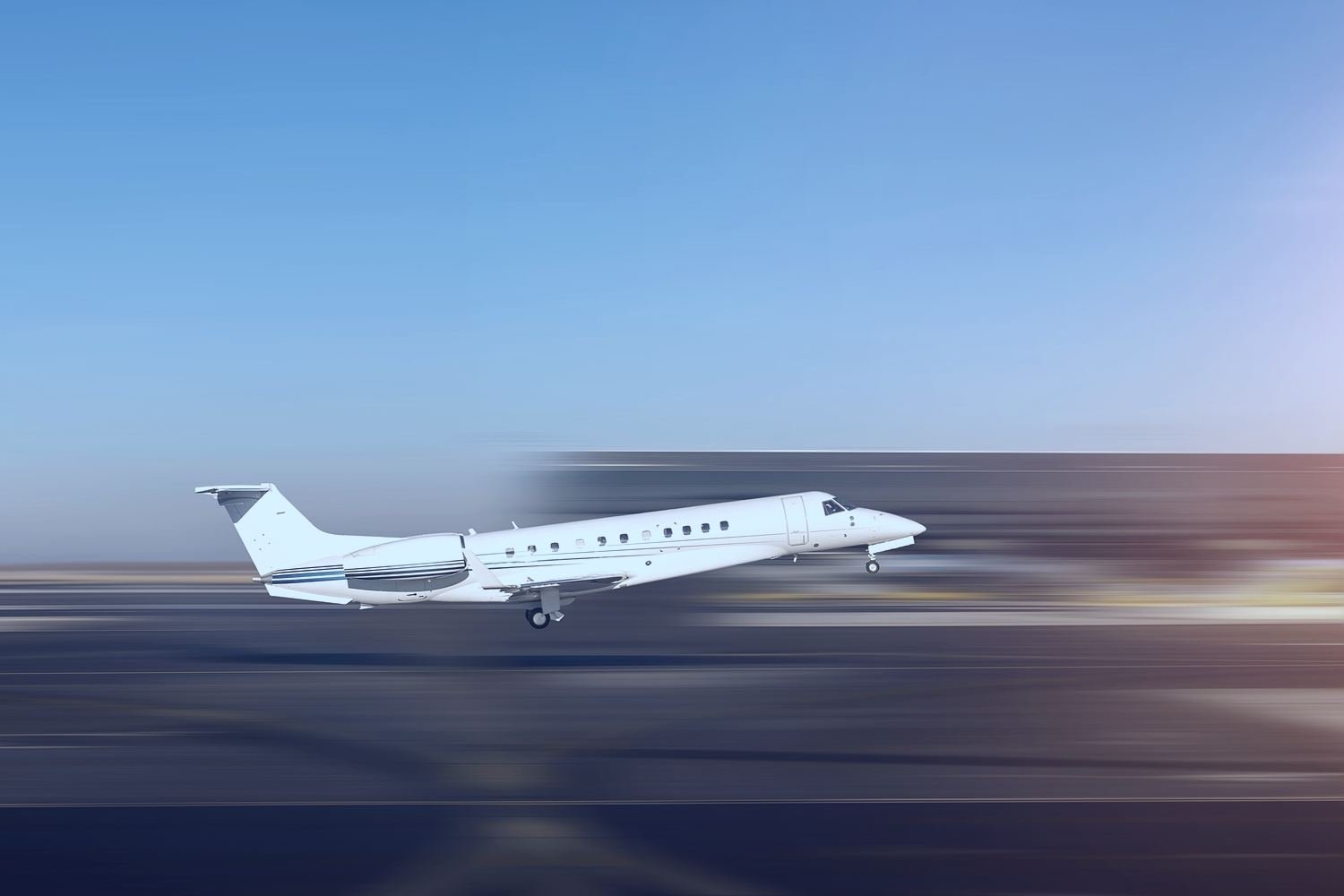 Super light jet departing a runway
